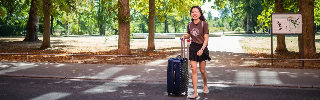 International Student with Suitcase